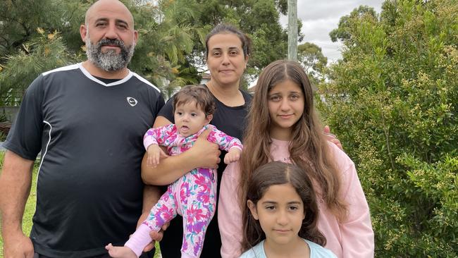 Peter and Jackie Botros with their daughters Christelle, six months, Ella, 11, and Ava, six. They are neutral about 5G cells.