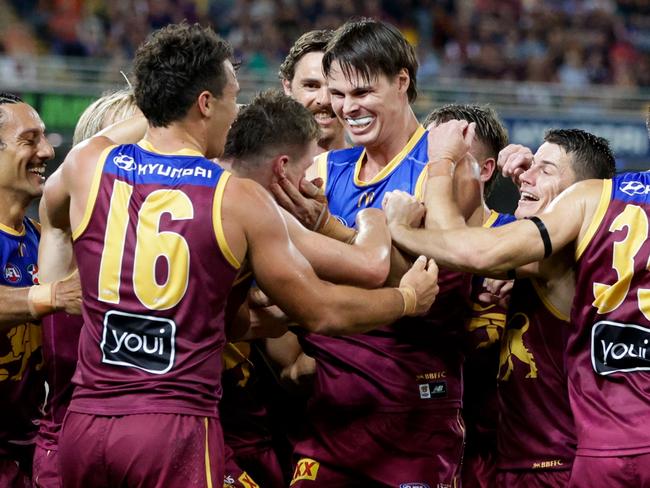 BRISBANE, AUSTRALIA – MAY 05: Logan Morris of the Lions celebrates a goal during the 2024 AFL Round 08 match between the Brisbane Lions and the Gold Coast SUNS at The Gabba on May 05, 2024 in Brisbane, Australia. (Photo by Russell Freeman/AFL Photos via Getty Images)