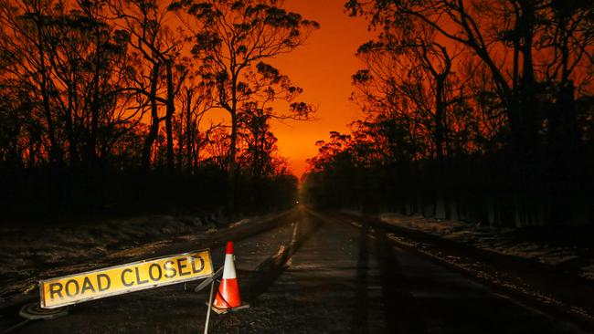 Fire closes in on the township of Mallacoota. Picture: David Caird