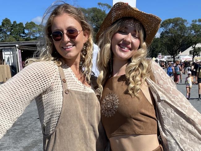 Brit Gillespie, 27, from Newcastle and Emi Aiken, 23, from Lennox head at Byron Bay's Bluesfest festival, March 30 2024. Picture: Savannah Pocock