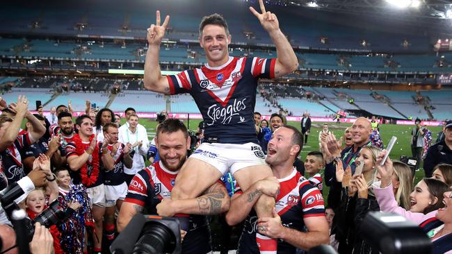 The Sydney Roosters' Cooper Cronk in his final game is chaired from the field during the 2019 NRL Grand Final between the Sydney Roosters and Canberra Raiders at ANZ Stadium on 6 October, 2019 in Sydney. Picture. Phil Hillyard