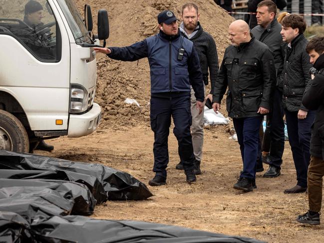 Ukraine's Prosecutor General Iryna Venediktova and Prosecutor of the International Criminal Court, Britain's Karim Khan, visit a mass grave in Bucha. Picture: AFP.