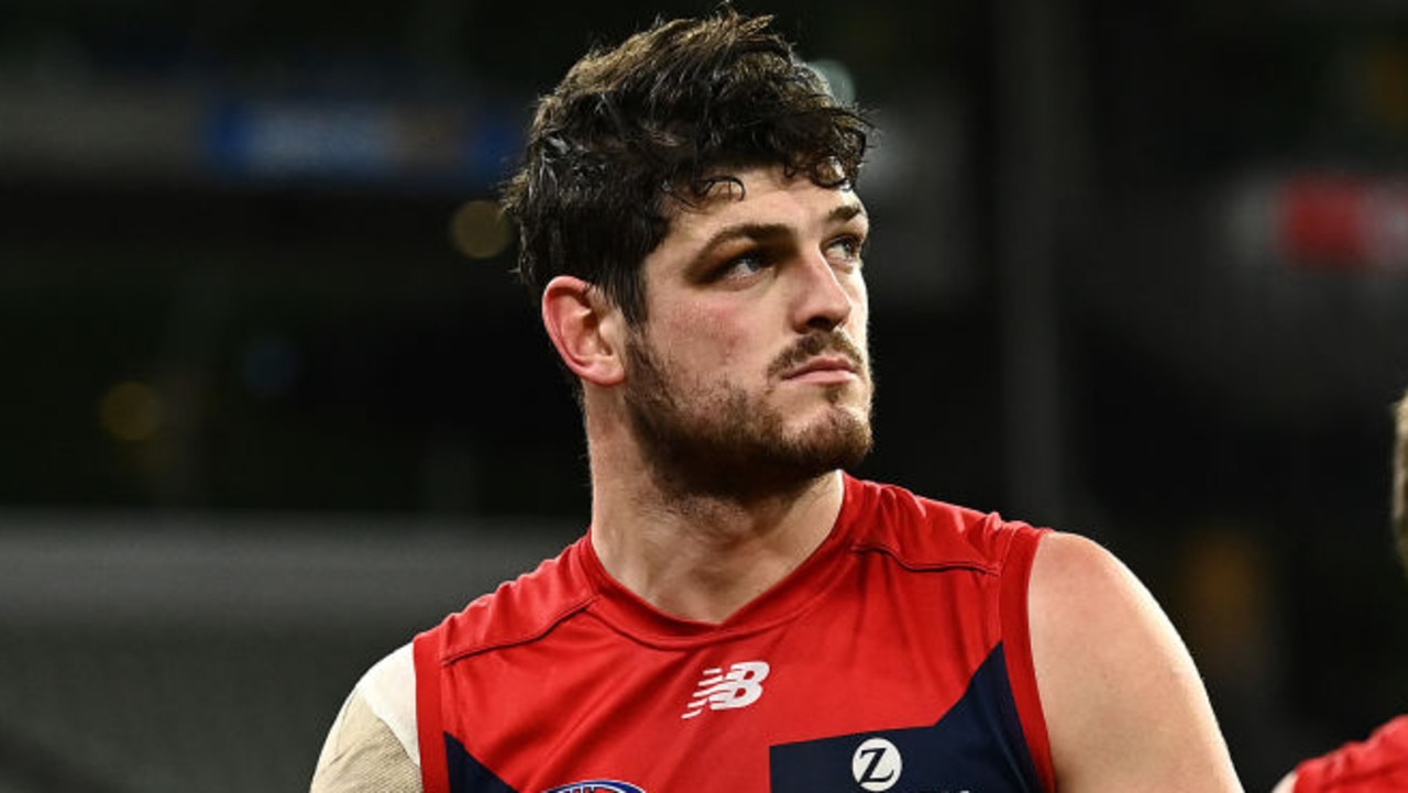 MELBOURNE, AUSTRALIA - JULY 17: Angus Brayshaw of the Demons looks dejected after the game ended in a draw during the round 18 AFL match between Melbourne Demons and Hawthorn Hawks at Melbourne Cricket Ground on July 17, 2021 in Melbourne, Australia. (Photo by Quinn Rooney/Getty Images)