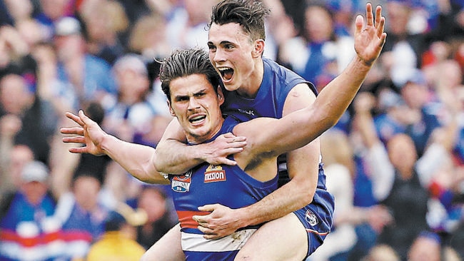 Tom Boyd and Toby McLean celebrate a goal in the 2016 Grand Final. Picture: Wayne Ludbey