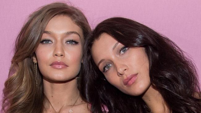 PARIS, FRANCE - NOVEMBER 30:  L-R) Gigi Hadid and Bella Hadid pose backstage prior to the Victoria's Secret Fashion Show on November 30, 2016 in Paris, France. (Photo by Pascal Le Segretain/Getty Images for Victoria's Secret)