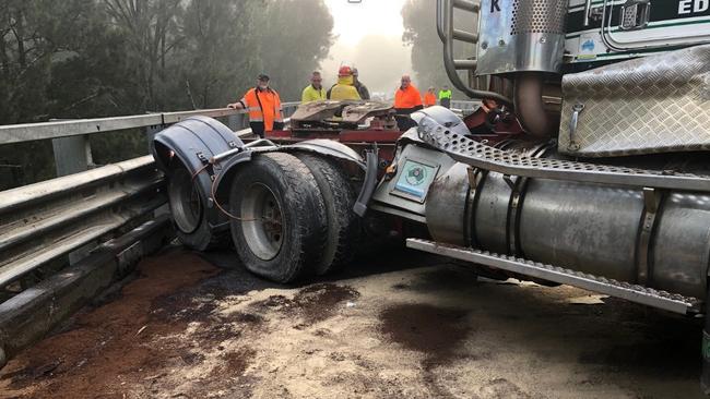 Hazmat crews from Fire and Rescue NSW Eden with assistance from RFS Brogo units assisted in mopping up a fuel spill resulting from a crash near Carbago. Picture: FRNSW Eden