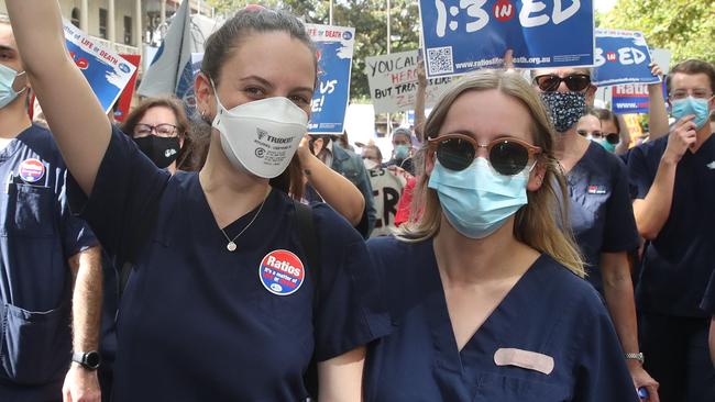 SYDNEY, AUSTRALIA - NewsWire FEBRUARY 15, 2022: Nurses from across Sydney gathered in front of NSW Parliament today to protest staff shortages and wages.   Picture: NCA NewsWire / David Swift