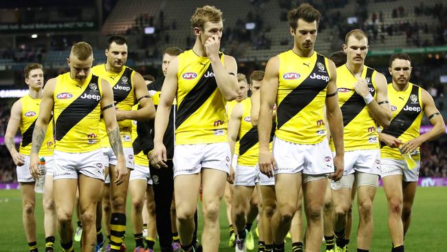 The Tigers walk off the ground following their loss to St Kilda. (Photo by Michael Willson/AFL Media/Getty Images)