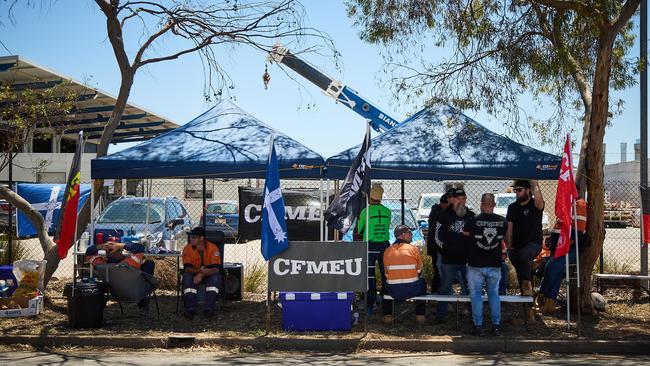 CFMEU-backed workers on strike outside Crane Services in Wingfield. Picture: Matt Loxton