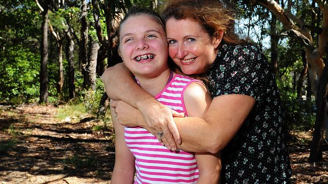 At age 14 Natasha, pictured with mum Fiona, spoke about climbing Mt Kusciuszko with a group of other young people. Picture: Virginia Young.