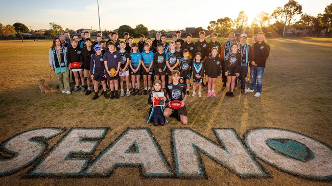 Cameron, 14, and Maggie, 9, whose father Sean Adams, died after a tragic accident. (Georgia, 16, is not pictured.) Mr Adams was a coach at Newport Power Junior Football Club, which has rallied behind the family. Picture: Mark Stewart