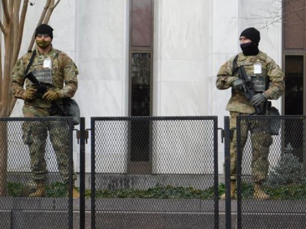 National Guard troops at Capitol Hill, behind 'unscalable' fencing. Picture: Nathan Vass, News Corp