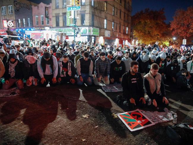 People pray in support of Palestinians during a rally to call for a ceasefire in the Brooklyn borough of New York City. Picture: AFP