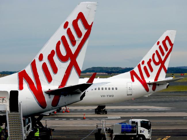 SYDNEY, AUSTRALIA - NewsWire Photos - SEPTEMBER 09, 2022: General generic editorial stock image of Virgin airplane at Sydney Domestic Airport. Picture: NCA NewsWire / Nicholas Eagar