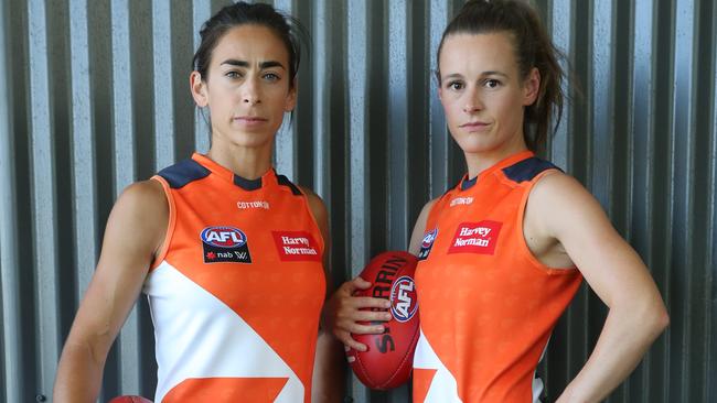 Former Magpie Alicia Eva (right) with GWS captain Amanda Farrugia. Picture: David Swift.