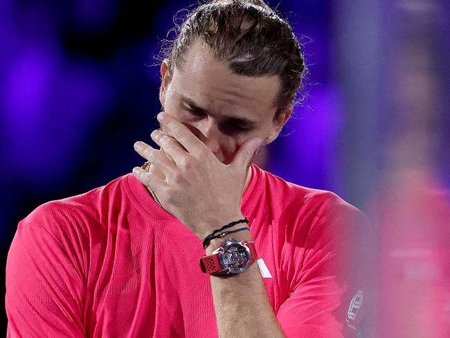 TOPSHOT - Germany's Alexander Zverev reacts after losing the men's singles final match against Italy's Jannik Sinner on day fifteen of the Australian Open tennis tournament in Melbourne on January 26, 2025. (Photo by Martin KEEP / AFP) / -- IMAGE RESTRICTED TO EDITORIAL USE - STRICTLY NO COMMERCIAL USE --