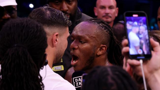 KSI and Tommy Fury confront each other in the ring. (Photo by Paul Harding/Getty Images)