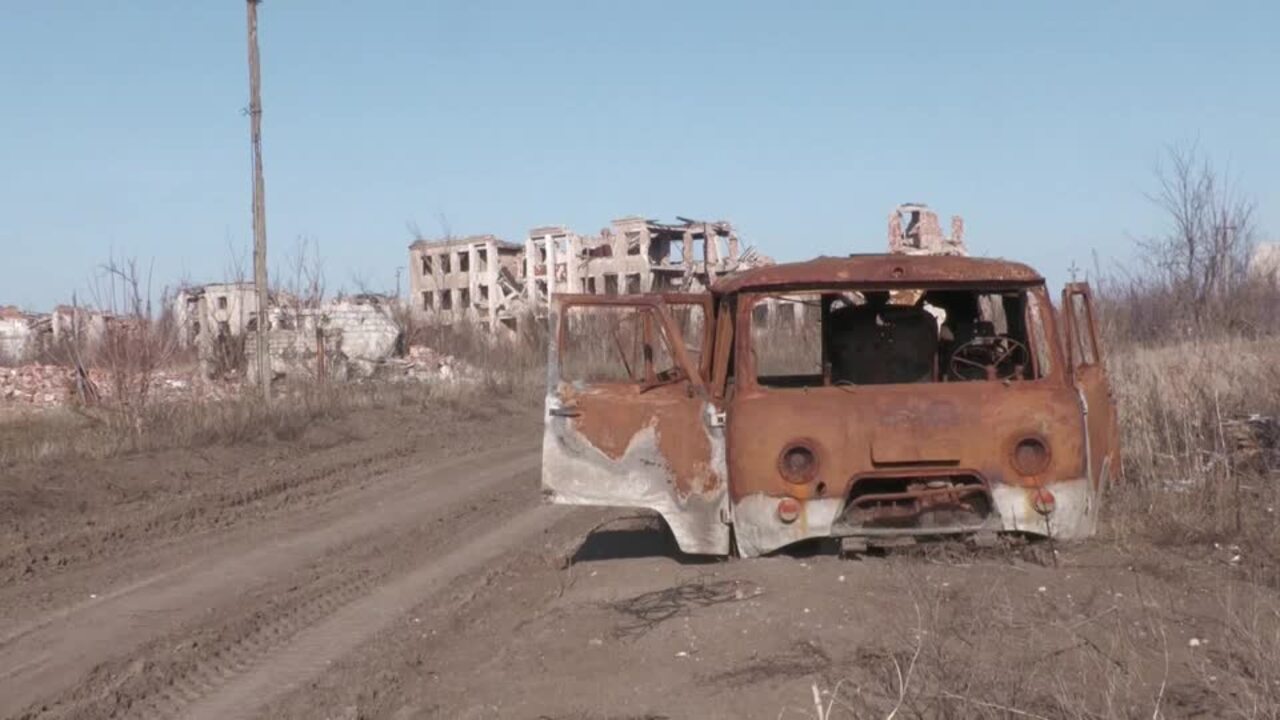 Ukrainian villagers visit ruined homes in Russian-controlled Donetsk