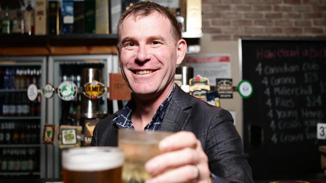 Labor candidate Nick champion with a rum at Murrays BBQ and Bar in Gawler. Picture: Dylan Coker