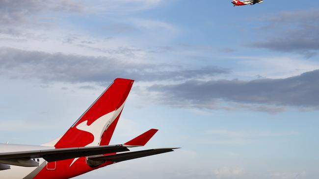 BRISBANE AUSTRALIA THURSDAY 19TH DECEMBER 2024 Generic picture of a QANTAS and  a Virgin Australia plane at the Brisbane International Airport Picture David Clark