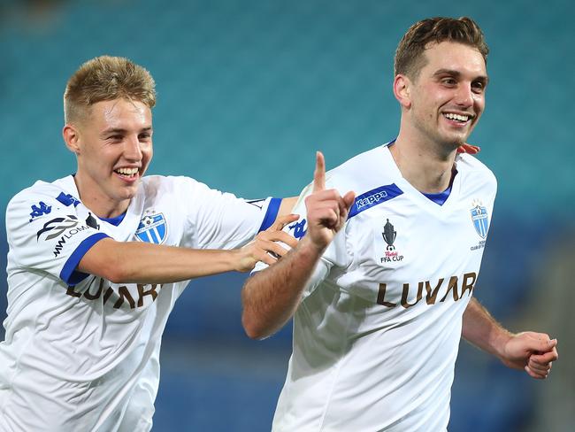 Milos Lujic of South Melbourne celebrates scoring.