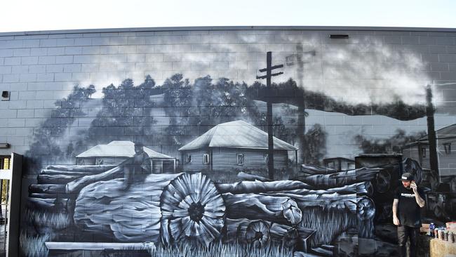 Street Artist Ross Holloway is almost finished his newest work of art in Nambour. Picture: Patrick Woods.