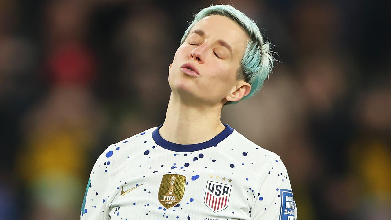 Megan Rapinoe of USA reacts after missing her team's fourth penalty.