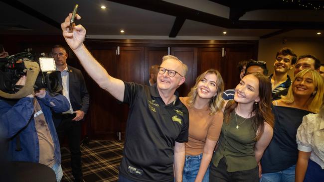 Anthony Albanese takes a selfie with university students at the Paddo Tavern in Brisbane. Picture: Mark Stewart/NewsWire