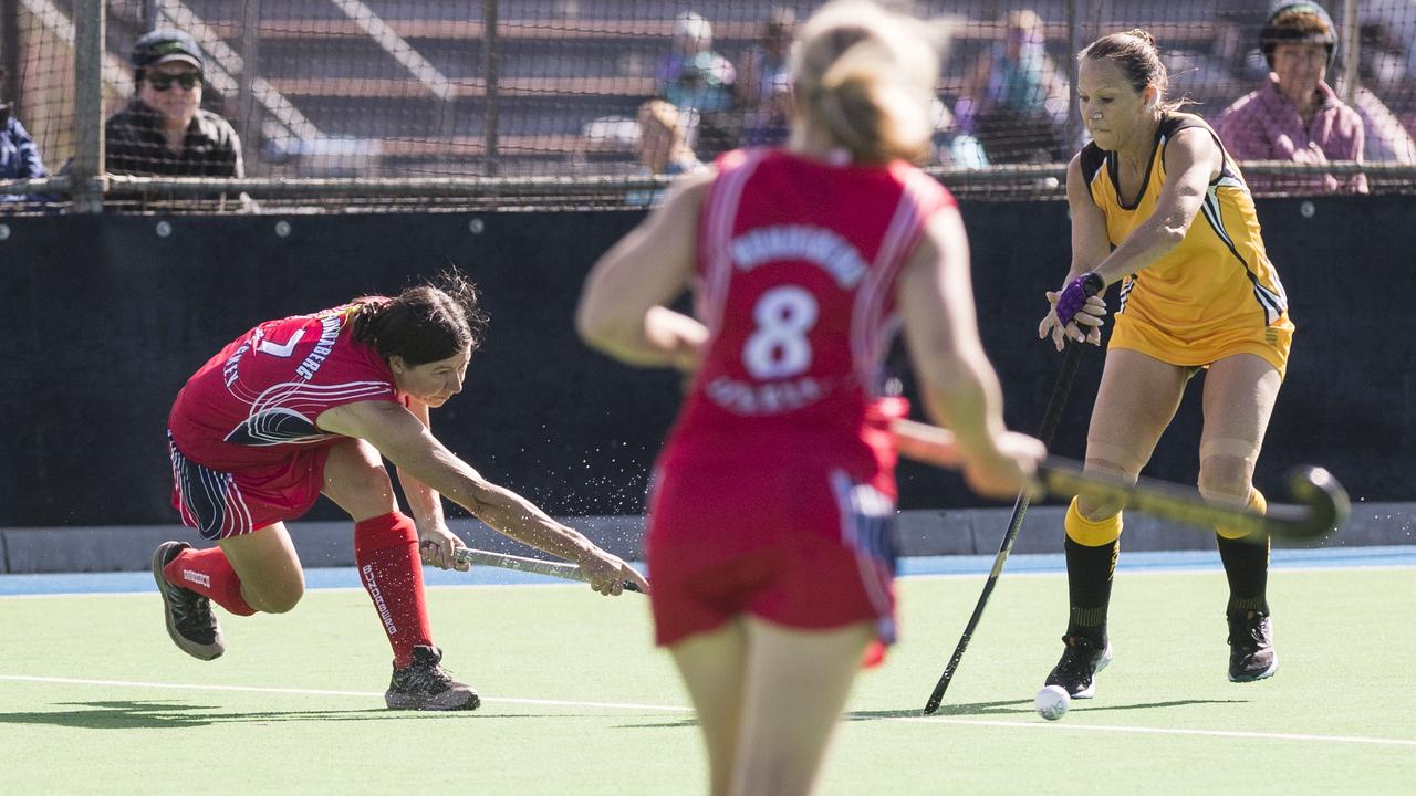 Leah McLaren (left) of Bundaberg 1 against Sunshine Coast 1.