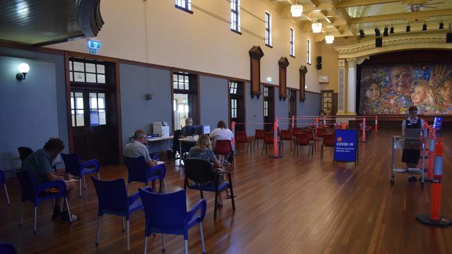 VACCINE HUB: Patients wait to receive their COVID vaccination at the Maryborough City Hall. Photo: Stuart Fast