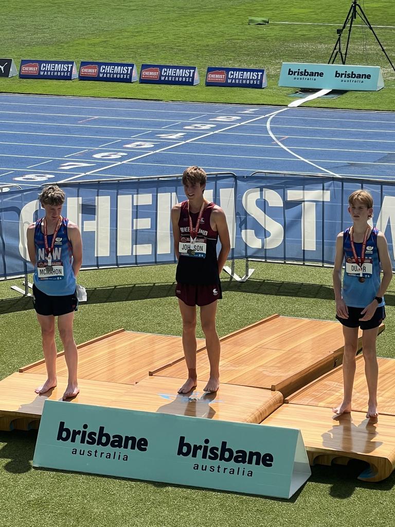 Cedar Johnson receives his gold medal at the All Schools Athletics Championships