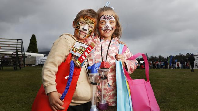 Twins Harrison and Eloise Young, 7, with their showbags. Day one of the Hobart Show 2023. Picture: Nikki Davis-Jones