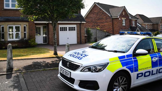 Police drive past the home Scotland's former First Minister and former leader of the SNP, Nicola Sturgeon, and her husband Peter Murrell, in Glasgow on June 11, 2023. Picture: AFP.