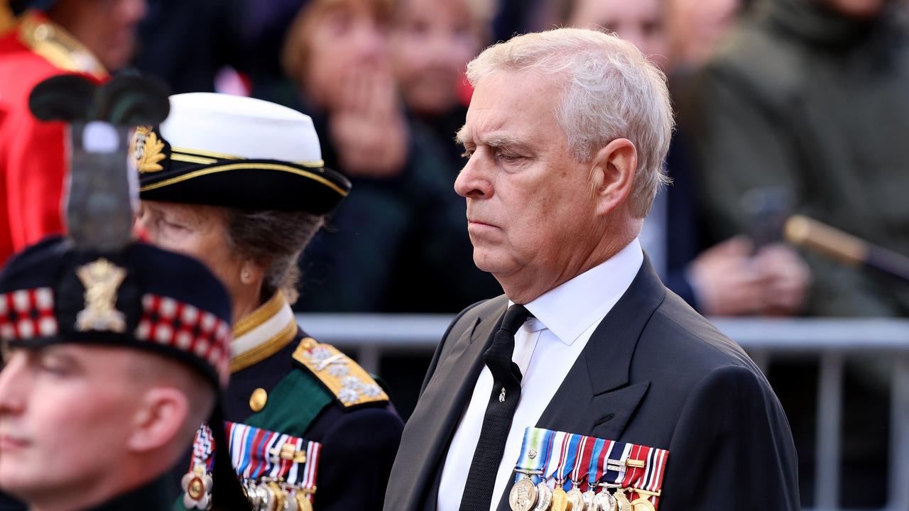 EDINBURGH, SCOTLAND – SEPTEMBER 12: Princess Anne, Princess Royal and Prince Andrew, Duke of York walk behind Queen Elizabeth II's Coffin as it heads to St Giles Cathedral, after making its way along The Royal Mile on September 12, 2022 in Edinburgh, Scotland. King Charles III joins the procession accompanying Her Majesty The Queen's coffin from the Palace of Holyroodhouse along the Royal Mile to St Giles Cathedral. The King and The Queen Consort, accompanied by other Members of the Royal Family also attend a Service of Prayer and Reflection for the Life of The Queen where it lies in rest for 24 hours before being transferred by air to London. (Photo by Robert Perry/Getty Images)