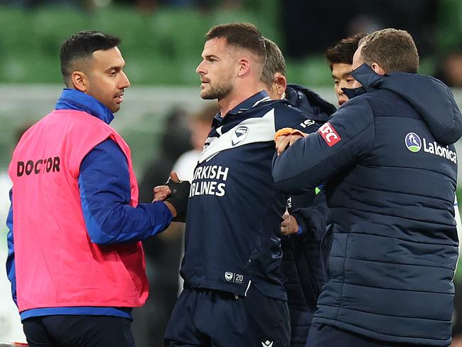 Brendan Hamill is assisted from the pitch after sustaining an injury. Picture: Getty Images