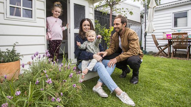 ‘COVID-19 brought out the best in many of us’ … Josh and Alice Lambert with their daughters Ruby, 5, and Florence, 1, at home in Melbourne. Picture: Aaron Francis