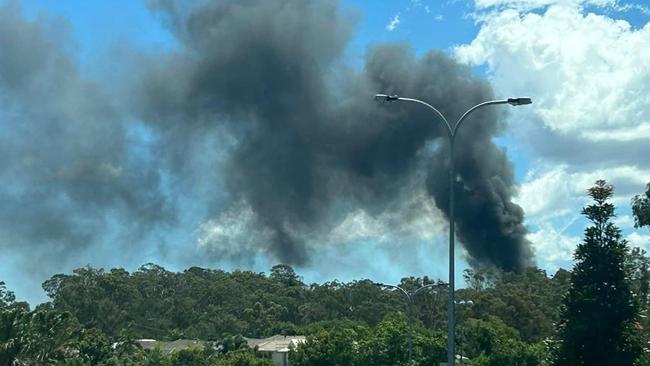 Police and fire crews were called to a fire off of the Old Pacific Hwy in Pimpama around 10.50am on Friday. Photo: Taylor Moore/Facebook