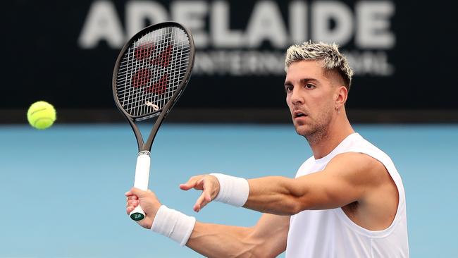 Thanasi Kokkinakis warms up in Adelaide. Picture: Sarah Reed/Getty Images