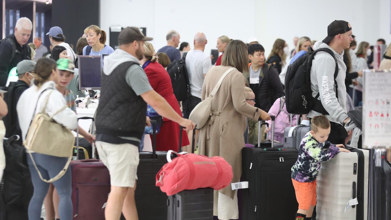Not only will prices for flights skyrocket from March 25 to 28, domestic terminals being packed to the brim. Picture: David Crosling