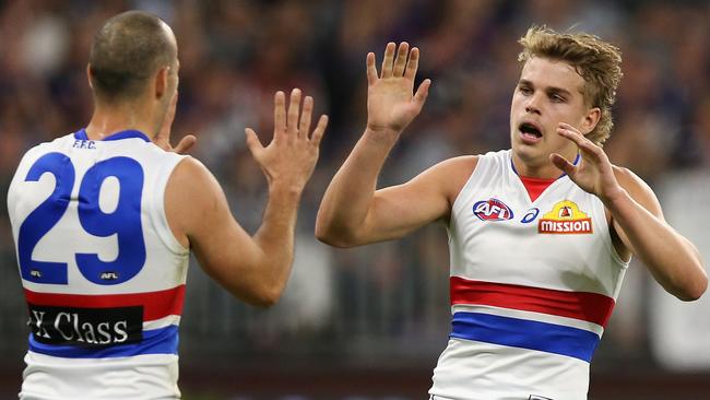 Tory Dickson and Bailey Smith celebrate a goal. Pic: Getty Images