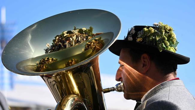 A brass musician plays his instrument during the last day of the Oktoberfest beer festival in Munich, Germany. Picture: Christof Stache/AFP