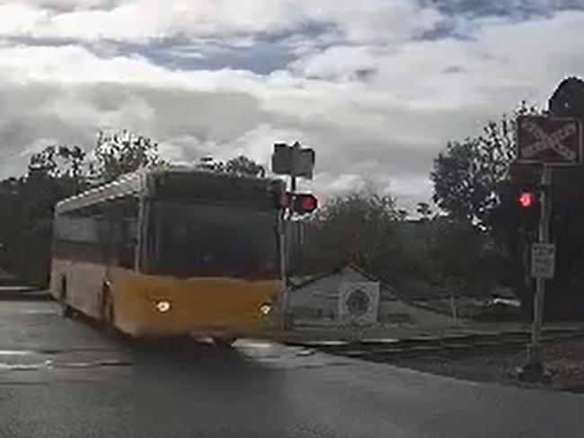 A bus driver's red light run has been caught on camera