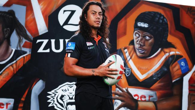 ON HOLD: EMBARGOED UNTIL TUESDAY 6PM: For the The Daily Telegraph 14.12.2024 Jarome Luai pictured in front of the new sponsors mural. Zurich. Wests Tigers members only training session at Zurich Centre, Concord.   Picture: Rohan Kelly