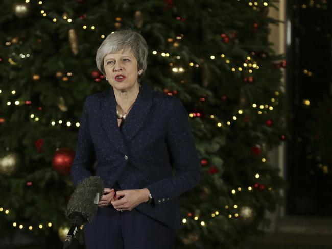 British Prime Minister Theresa May makes a statement outside 10 Downing Street, in London, Wednesday December 12, 2018. British Prime Minister Theresa May survived a brush with political mortality Wednesday, winning a no-confidence vote of her Conservative lawmakers that would have ended her leadership of party and country (AP Photo/Tim Ireland)