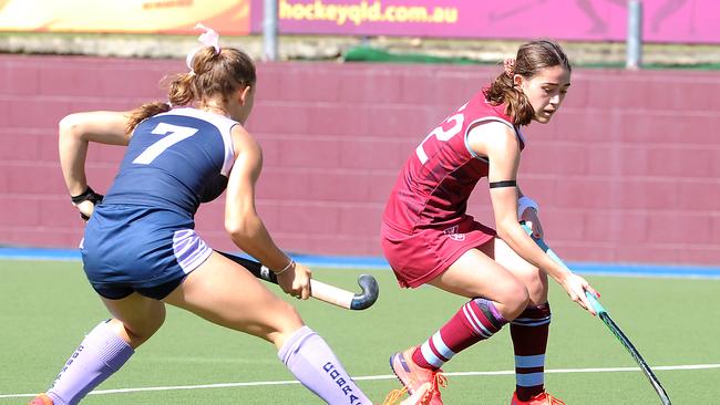 Uni player Abbey Hill wearing a black arm band in honour of her grandfather Michael. Picture, John Gass.