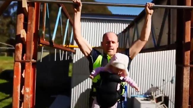 Sam Goodall training in his backyard with his daughter.