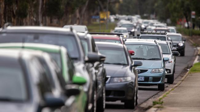 Motorists queue at a Covid testing site in Melbourne. Picture: NCA NewsWire / Sarah Matray