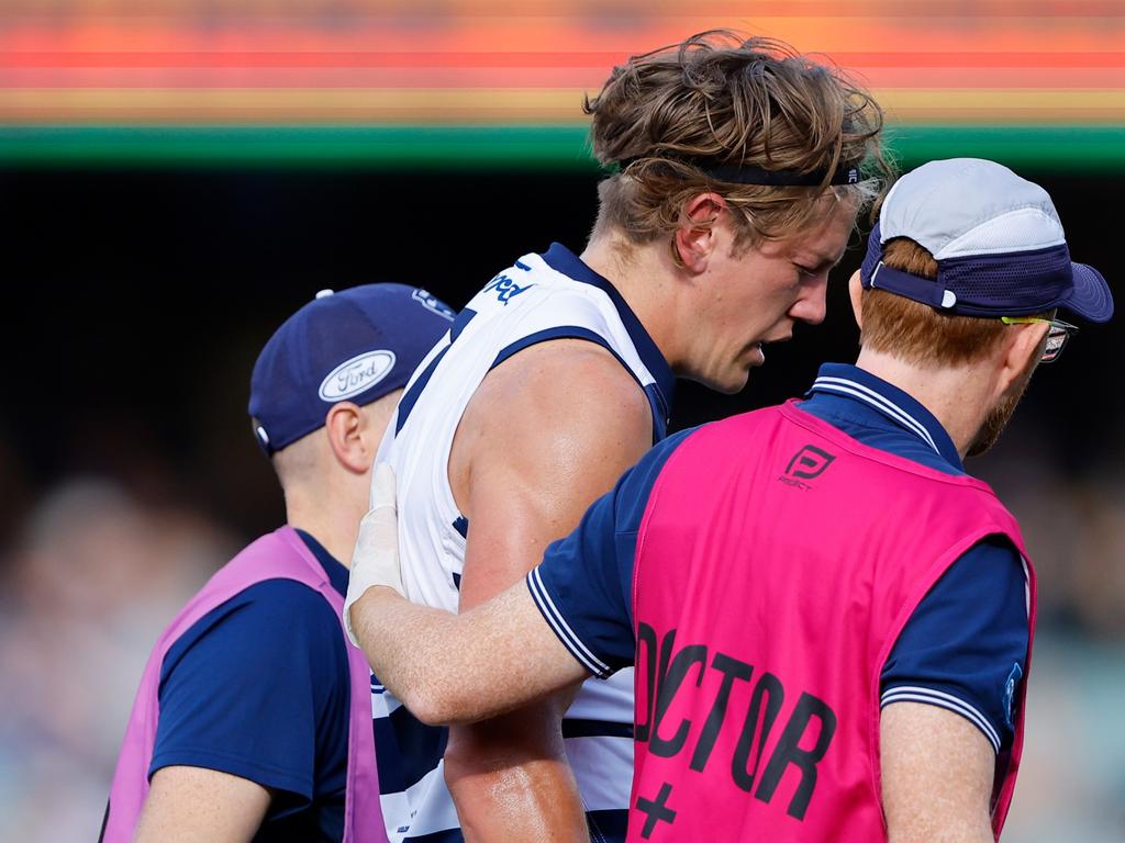 Rhys Stanley is helped from the ground. Picture: Dylan Burns/AFL Photos via Getty Images