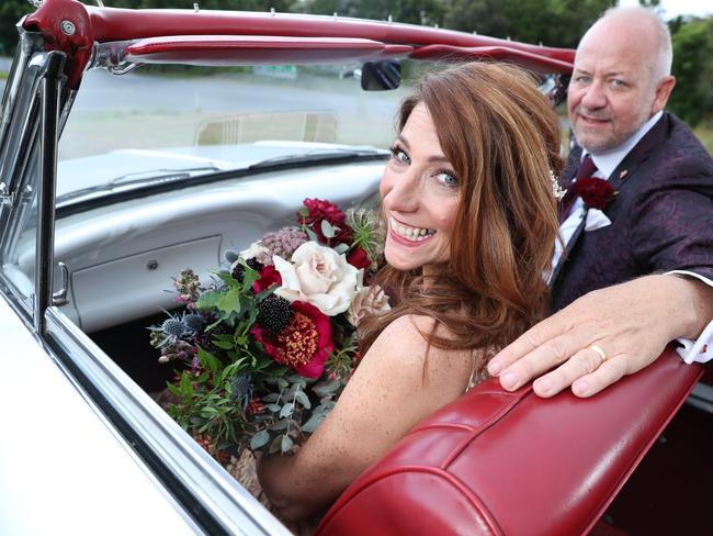 The happy couple head off for a new life together. Picture: Liam Kidston