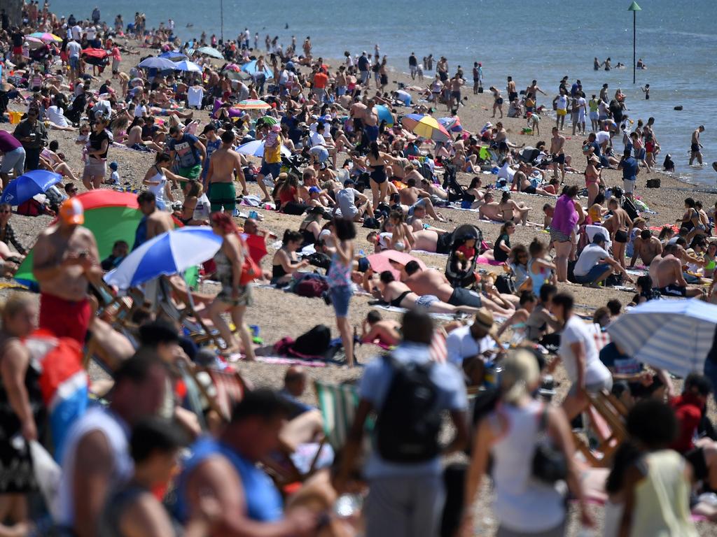 The move has sparked fears others will ignore social distancing rules, like these beachgoers in Southend-on-Sea. Picture: Ben STANSALL / AFP.